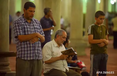 Egyptian Muslim worshipers perform "Taraweeh", nightly prayer of the month of Ramadan, at Amr Ibn al-Aas mosque, in Cairo, Egypt on June 08, 2016. Ramadan is sacred to Muslims because it is during that month that traditi...