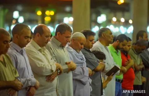 Egyptian Muslim worshipers perform "Taraweeh", nightly prayer of the month of Ramadan, at Amr Ibn al-Aas mosque, in Cairo, Egypt on June 08, 2016. Ramadan is sacred to Muslims because it is during that month that traditi...