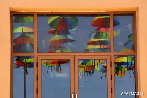 A Picture taken in June 9, 2016 shows beachside café shop was decorate its terrace with hanging colourful umbrellas as part of decorations for the Muslim holy fasting month of Ramadan in Gaza City. Ramadan is sacred to M...