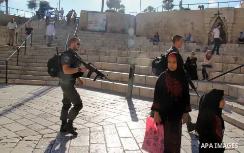 Israeli policemen stand guard at the Al-Aqsa Mosque, in Jerusalem, on June 9, 2016. Photo by Mahfouz Abu Turk