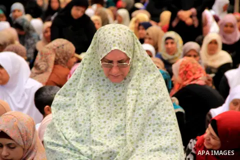 Palestinians pray in front of the Dome of the Rock at Jerusalem's Al-Asqa mosque compound during the first Friday prayers of the holy Muslim fasting month of Ramadan on June 10, 2016. Praying at the site, the third-holie...