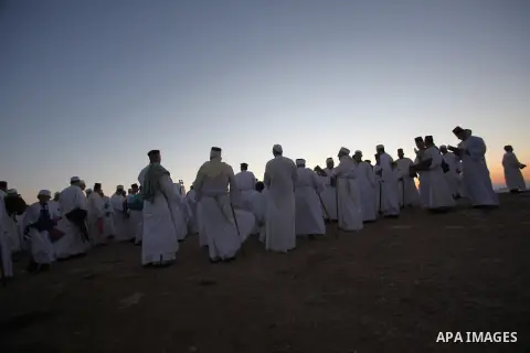 Members of the Samaritan sect take part in a traditional pilgrimage marking the holiday of Shavuot, atop Mount Gerizim near the West Bank city of Nablus early June 12, 2016. Photo by Nedal Eshtayah