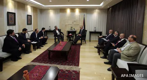 Palestinian Prime Minister Rami Hamdallah meets with a delegation from the Greek Syriza party, in the West Bank city of Ramallah on June 12, 2016. Photo by Prime Minister Office
