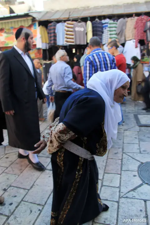 Palestinians shop at a market during the Muslim holy fasting month of Ramadan in Jerusalem's old city on June, 12, 2016. Ramadan is sacred to Muslims because it is during that month that tradition says the Koran was reve...