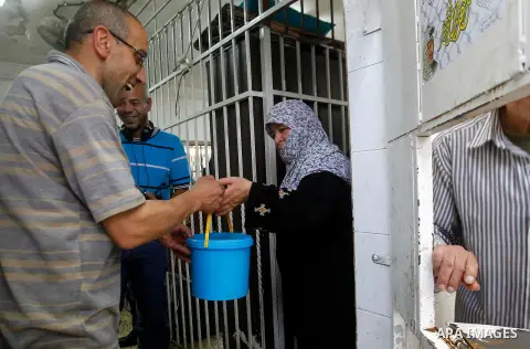 Palestinians prepare food to be distributed for free during the holy fasting month of Ramadan in the West Bank city of Hebron, 13 June 2016. the "Ibrahimi Takiya" was founded in 960 AD as an institute provides food for o...
