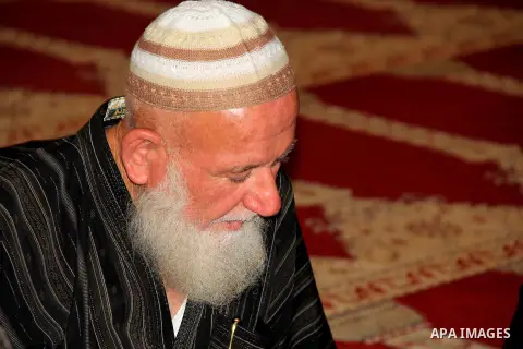A Palestinian man reads the Koran, Islam's holy book, at al-Aqsa mosque during the holy month of Ramadan, in Jerusalem's old city on June 14, 2016. Ramadan is sacred to Muslims because it is during that month that tradit...