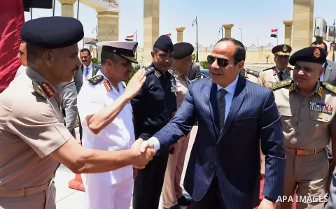 Egyptian President Abdel Fattah al-Sisi performs Friday prayers at Al-Tantawi mosque, to mark the anniversary of the Tenth of Ramadan, in Cairo, Egypt, on June 17, 2016. Photo by Egyptian President Office