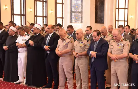 Egyptian President Abdel Fattah al-Sisi performs Friday prayers at Al-Tantawi mosque, to mark the anniversary of the Tenth of Ramadan, in Cairo, Egypt, on June 17, 2016. Photo by Egyptian President Office