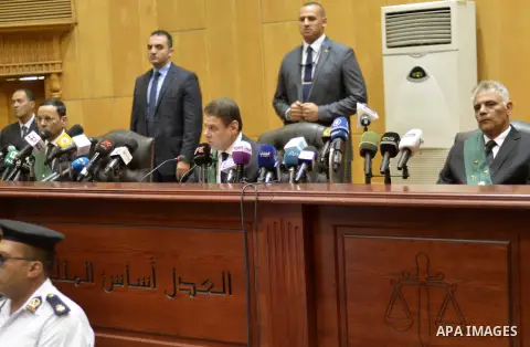 An Egyptian Judge Mohamed Sirin Fahmy conducts the trial of Egypt's ousted President Mohamed Morsi at a court in Cairo on June 18, 2016. An Egyptian court sentenced Morsi to life in prison in an espionage trial in which...