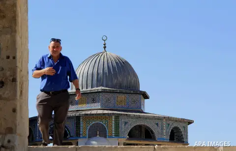 A Palestinian man walks following (Asr) prayer during the holy fasting month of Ramadan at al-Aqsa mosque, in Jerusalem's old city on June 20, 2016. Ramadan is sacred to Muslims because it is during that month that tradi...