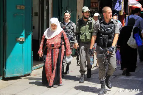 Israeli policemen stand guard at a market during the holy fasting month of Ramadan, in Jerusalem's old city on June 20, 2016. Ramadan is sacred to Muslims because it is during that month that tradition says the Koran was...