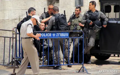 Israeli policemen stand guard at a market during the holy fasting month of Ramadan, in Jerusalem's old city on June 20, 2016. Ramadan is sacred to Muslims because it is during that month that tradition says the Koran was...