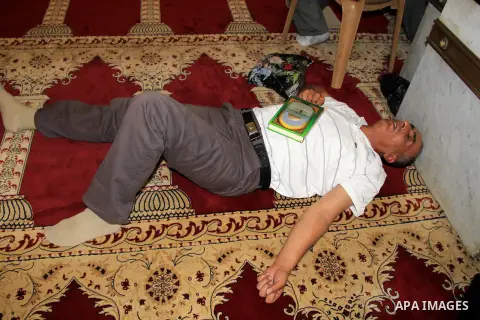 A Palestinian Muslim worshipper sleep at al-Aqsa mosque, in Jerusalem's old city on June 20, 2016. Ramadan is sacred to Muslims because it is during that month that tradition says the Koran was revealed to the Prophet Mo...