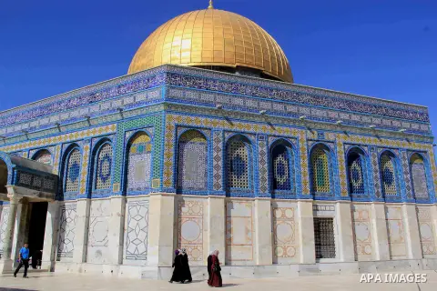 Palestinians walk following (Asr) prayer during the holy fasting month of Ramadan at al-Aqsa mosque, in Jerusalem's old city on June 20, 2016. Ramadan is sacred to Muslims because it is during that month that tradition s...