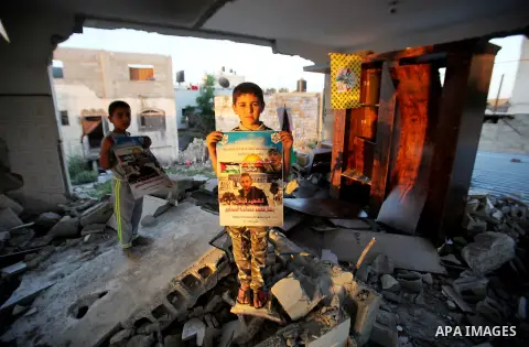 Palestinians inspect the home of the Bashar Masalha that was demolished by the Israeli military in the West bank city of Qalqilya, on June 21, 2016. Bashar Masalha was killed in Jaffa city on 8 March 2016, under the pret...