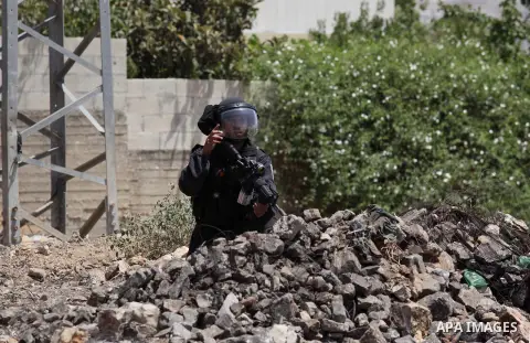 Israeli security forces advance during clashes with Palestinian protesters following a demonstration against the expropriation of Palestinian land by Israel on June 24, 2016 in the village of Kfar Qaddum, near Nablus, in...