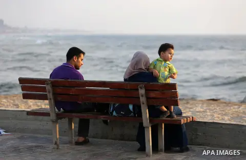 Palestinian muslims prepare to break their fast on the holy fasting month of Ramadan at the beach of the Mediterranean sea on the coast of Gaza city during a hot day, on June 24, 2016. Ramadan is sacred to Muslims becaus...