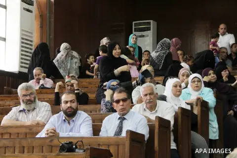 Relatives of Ansar Bait Al-Maqdis group attend their trial in Cairo on June 25, 2016, on charges of assassination of police officers, attempted assassination of interior minister Mohamed Ibrahim and explosions near secur...