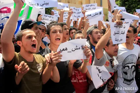Egyptian students take part during a protest against cancelled a high school final exam in front of education ministry, in Cairo, Egypt, on June 27, 2016. Egypt cancelled a high school final exam yesterday after papers f...