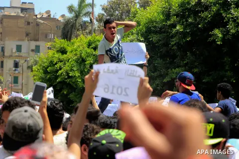 Egyptian students take part during a protest against cancelled a high school final exam in front of education ministry, in Cairo, Egypt, on June 27, 2016. Egypt cancelled a high school final exam yesterday after papers f...