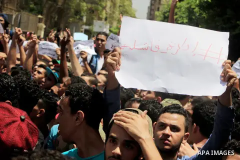 Egyptian students take part during a protest against cancelled a high school final exam in front of education ministry, in Cairo, Egypt, on June 27, 2016. Egypt cancelled a high school final exam yesterday after papers f...