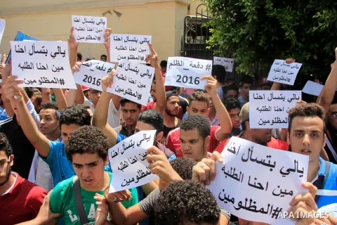 Egyptian students take part during a protest against cancelled a high school final exam in front of education ministry, in Cairo, Egypt, on June 27, 2016. Egypt cancelled a high school final exam yesterday after papers f...