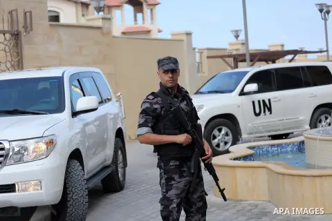 A member of Palestinian security forces loyal to Hamas stands guard during the U.N. Secretary-General Ban Ki-moon visits a Qatari-funded rehabilitation and artificial limbs hospital in the northern Gaza Strip June 28, 20...