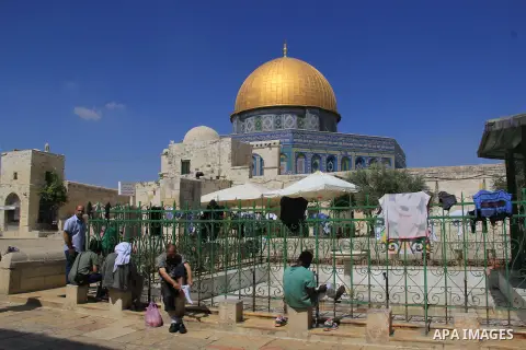 Palestinians clean their hands before prayers during the holy month of Ramadan near the Dome of the Rock on the compound known to Muslims as Noble Sanctuary and to Jews as Temple Mount in Jerusalem's old city, on June 28...