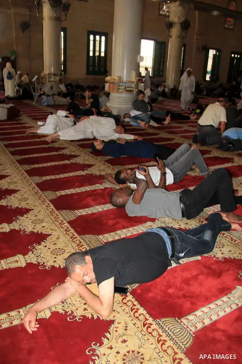 Palestinian Muslim worshipper sleep at al-Aqsa mosque, in Jerusalem's old city, on June 28, 2016. An Israeli police spokesman said on Tuesday that the compound would be closed to visitors, including Jewish visitors, for...