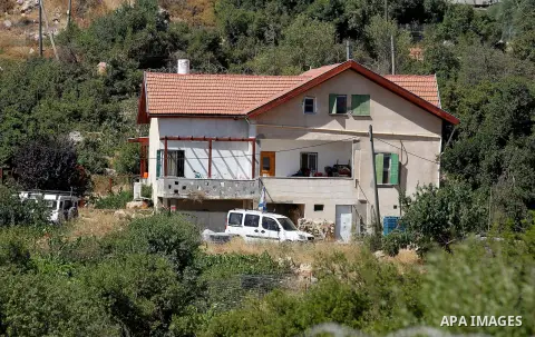 Israeli security forces gather near the scene of what the Israeli military said was an attack by Palestinian in the Jewish settlement of Kiryat Arba near the West Bank city of Hebron 30 June 2016. Israeli army said the P...