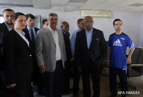 Chairman of the FIFA Monitoring Committee Israel-Palestine Tokyo Sexwale visits the headquarters of the Palestinian Football Association which witnesses said was damaged in past Israeli shelling, in the northern Gaza Str...