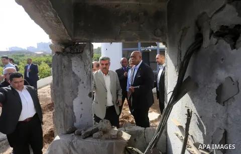 Chairman of the FIFA Monitoring Committee Israel-Palestine Tokyo Sexwale visits the headquarters of the Palestinian Football Association which witnesses said was damaged in past Israeli shelling, in the northern Gaza Str...