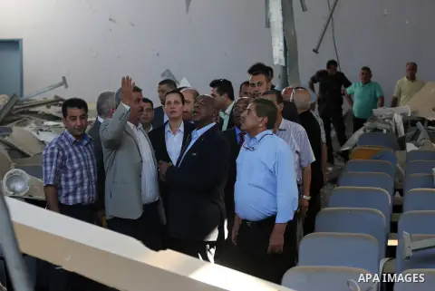 Chairman of the FIFA Monitoring Committee Israel-Palestine Tokyo Sexwale visits the headquarters of the Palestinian Football Association which witnesses said was damaged in past Israeli shelling, in the northern Gaza Str...