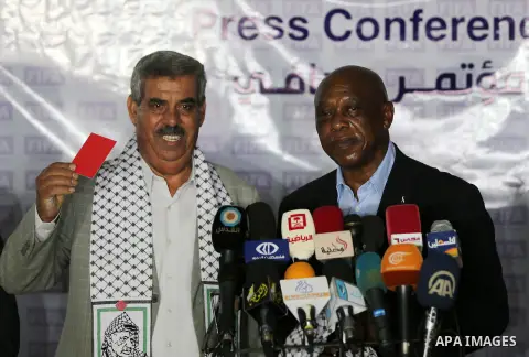 Chairman of the FIFA monitoring committee for Israel and Palestine, Tokyo Sexwale , speaks to the press following a visit to the Palestinian Football Association headquarters which witnesses said was damaged in past Isra...