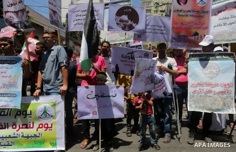 Palestinians take part in a rally marking al-Quds (Jerusalem) Day following Friday prayer in Gaza city on July 1, 2016. Photo by Mohammed Asad
