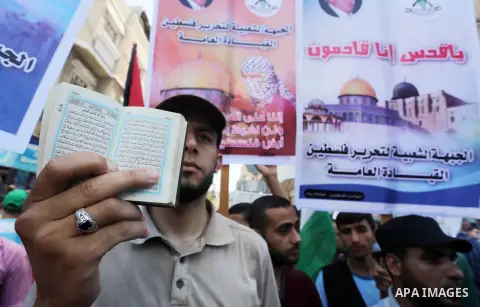 Palestinians take part in a rally marking al-Quds (Jerusalem) Day following Friday prayer in Gaza city on July 1, 2016. Photo by Mohammed Asad