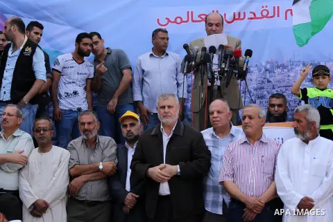 Palestinians take part in a rally marking al-Quds (Jerusalem) Day following Friday prayer in Gaza city on July 1, 2016. Photo by Mohammed Asad