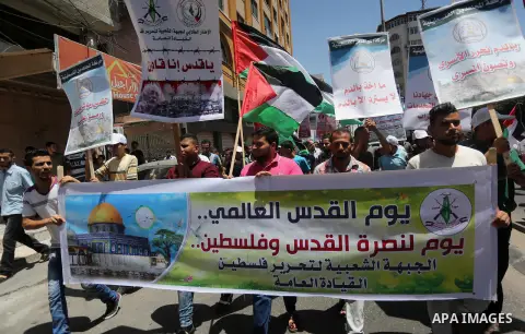 Palestinians take part in a rally marking al-Quds (Jerusalem) Day following Friday prayer in Gaza city on July 1, 2016. Photo by Mohammed Asad