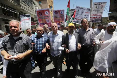 Palestinians take part in a rally marking al-Quds (Jerusalem) Day following Friday prayer in Gaza city on July 1, 2016. Photo by Mohammed Asad