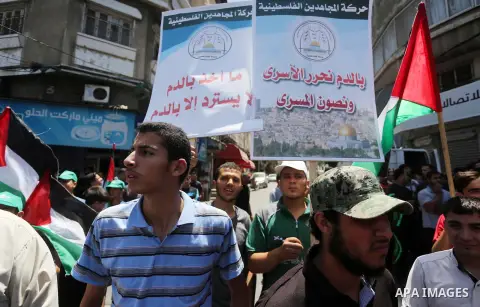 Palestinians take part in a rally marking al-Quds (Jerusalem) Day following Friday prayer in Gaza city on July 1, 2016. Photo by Mohammed Asad
