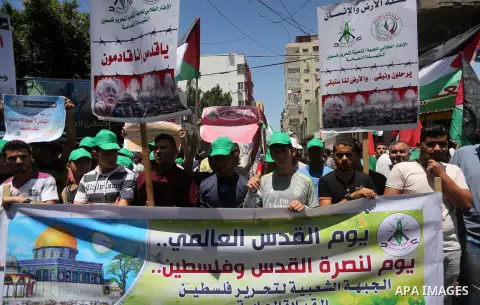 Palestinians take part in a rally marking al-Quds (Jerusalem) Day following Friday prayer in Gaza city on July 1, 2016. Photo by Mohammed Asad