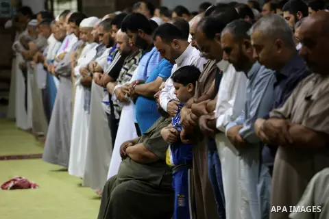 Palestinian Muslim worshippers pray overnight on July 2, 2016 at a Mosque in Gaza city on the occasion of Laylat al-Qadr which falls on the 27th day of the fasting month of Ramadan. Laylat al-Qadr, or Night of Destiny, m...