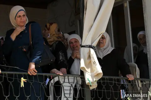Relatives of Palestinian Tayseer Habash, who died from tear gas fired by Israeli security forces during clashes, mourn during his funeral on July 2, 2016 in the West Bank city of Nablus. Habash, 63, died on July 1, 2016...