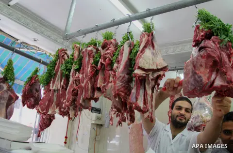 Palestinians shop at a market ahead of the Eid al-Fitr holiday, in Jerusalem old city, on July 3, 2016. Eid al-Fitr marks the end of Muslim's holy fasting month of Ramadan when faithfuls abstain from eating, drinking, sm...
