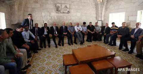 Palestinian Prime Minister Rami Hamdallah visits the mourning tent of Tayseer Habash, who died from tear gas fired by Israeli security forces during clashes, in the West Bank city of Nablus, on July 03, 2016. Photo by Pr...