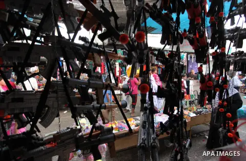 Palestinians shop at a market ahead of the Eid al-Fitr holiday, in Nuseirat refugee camp in the central Gaza Strip, on July 4, 2016. Eid al-Fitr marks the end of Muslim's holy fasting month of Ramadan when faithfuls abst...