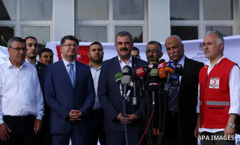 President of Turkish Red Crescent Kerem Kinik speaks during a press conference after humanitarian aid parcels provided by Turkey entered the southern Gaza Strip from Israel through the Kerem Shalom crossing July 4, 2016....