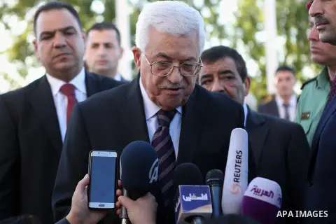 Palestinian President Mahmoud Abbas speaks to media following morning prayers for Eid al-Fitr celebrations, which marks the end of the holy fasting month of Ramadan, in the West Bank city of Ramallah July 6, 2016. Photo...
