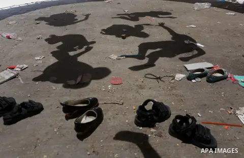 Palestinian children play on the second day of of Eid al-Fitr celebrations, which marks the end of the holy fasting month of Ramadan, at the al-Shati refugee camp in Gaza City on July 7, 2016. Photo by Mohammed Asad