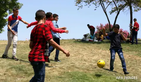 Egyptians play at a garden on the second day of of Eid al-Fitr celebrations, which marks the end of the holy fasting month of Ramadan, in Cairo, Egypt, on July 7, 2016. Photo by Amr Sayed